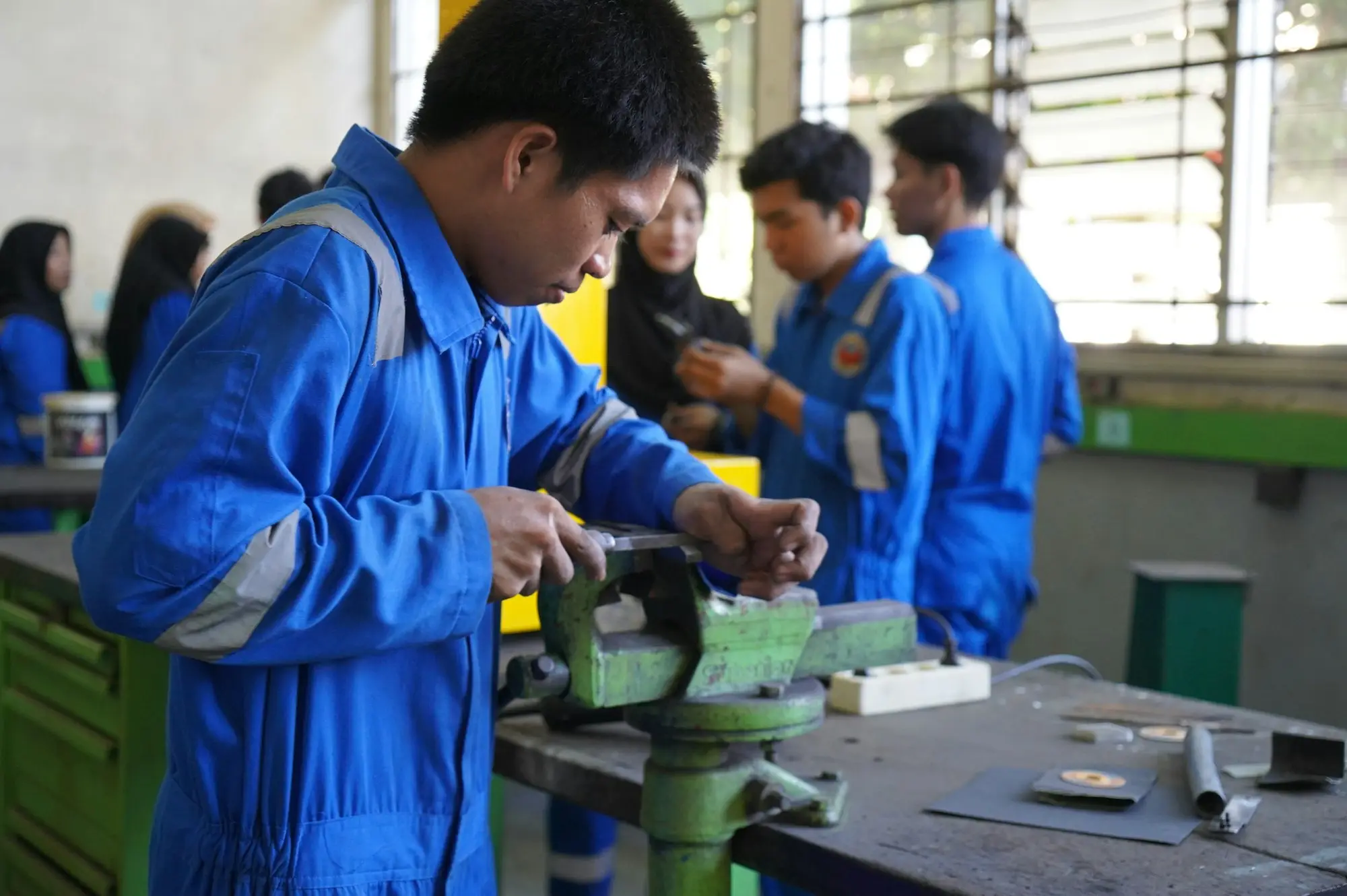 Machinist working in a factory